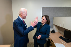Joe Biden high-fives Kamala Harris